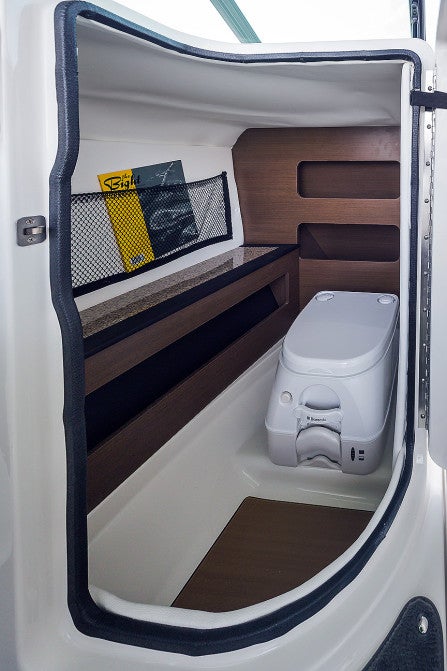 The head compartment inside the passenger console is surprisingly spacious for a 22-foot boat.