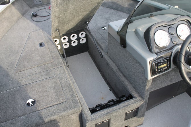 Located in the bow deck is a large rod locker, capable of accommodating eight rods in individual tubes.