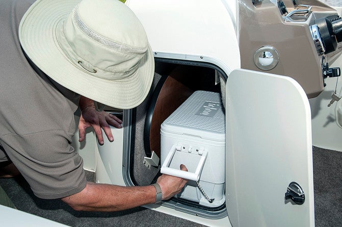 Integrated cooler storage in the helm is a nice touch. There’s also a dedicated spot for the removable table.